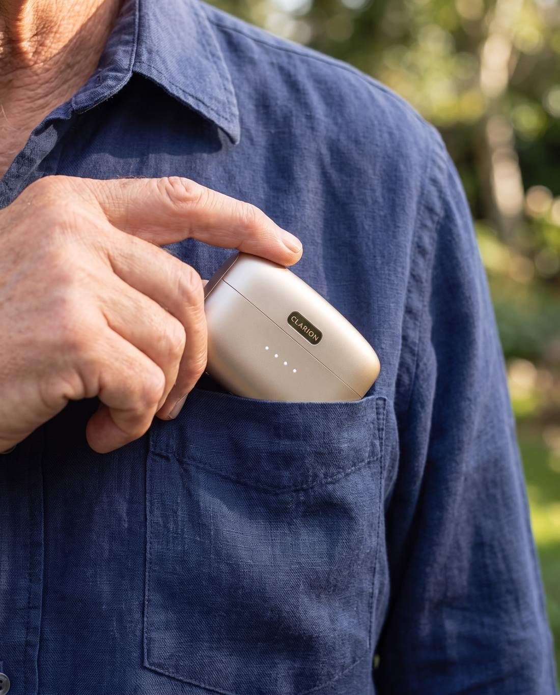 The closed Clarion case slipping into a shirt pocket, charge lights on.